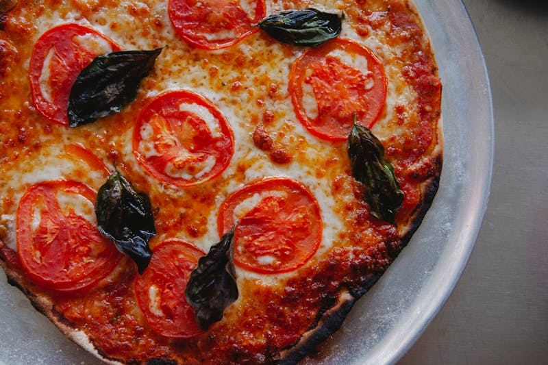 Classic Margherita mod pizza with fresh mozzarella and basil