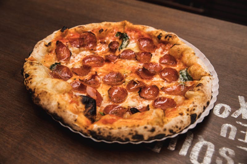 Four Cheese pizza with a blend of gourmet cheeses